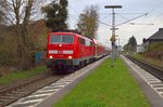 111 149 mit einem RE4 nach Aachen bei der Durchfahrt in Herrath. 6.4.2016