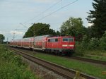 RE 4 nach Dortmund bei der Durchfahrt in Herrath.
Geschoben wird der Zug von der 111 016 am Abend des 5.7.2016