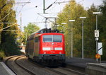 Ein Nachschuss von der 111 122 DB schiebt den RE4 aus Aachen-Hbf nach Dortmund-Hbf und kommt aus Richtung