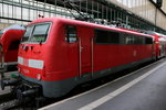 111 029 mit  westdeutschen  Dosto im Stuttgarter Hbf.