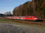 Die 111 043 mit einem M nach Salzburg am 21.12.2013 unterwegs bei Hufschlag.