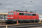 DB Lok 111 032-9 steht auf einem Abstellgleis beim badischen Bahnhof. Die Aufnahme stammt vom 08.01.2019.