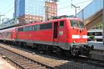 Lokportrait von der Freiburger 111 064 mit einer RB nach Neuenburg (Baden) im Freiburger Hauptbahnhof auf Gleis 3. (12.07.2013)