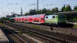 111 039 mit Werbung mit der Bahn in die Berge am 16 Juli 2011 am Heimeranplatz 
zu Mnchen.