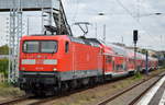 112 118 mit dem RE3 Richtung Endziel Berlin Hbf. bei der Ausfahrt Bf. Berlin-Lichtenberg 10.07.18