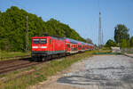 Die 112 185 rollte am 27.05.2023 mit ihrem RE3 3312 Lutherstadt Wittenberg - Stralsund, durch den Bahnhof von Miltzow.
