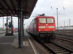 112 169 mit einem RE aus Halle/Saale am 03.02.2011 in Stendal.