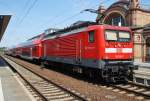 Hier 112 155-7 mit einem RE1 (RE4311)  Hanse-Epress  von Hamburg Hbf. nach Rostock Hbf., dieser Zug stand am 21.7.2014 in Schwerin Hbf.