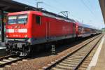 Hier 112 152-4 mit einem RE1 (RE4310)  Hanse-Express  von Rostock Hbf. nach Hamburg Hbf., dieser Zug stand am 21.7.2014 in Schwerin Hbf.