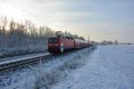 BR 112 (112 104) schiebt am 27.12.2014 den RE 5 (4355) nach Lutherstadt Wittenberg. Aufgenommen kurz nach der Durchfahrt Teltow.