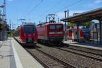 Drei DB Regio Reisezüge an den Bahnsteigen des Bahnhofs Waren Müritz. - 11.07.2015