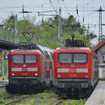 Zusammentreffen der Doppelstockgarnituren auf der Line RE5 am Hauptbahnhof in Neustrelitz im Mai 2021, in diesem Falle gezogen/geschoben von 112 186 und 112 190.
