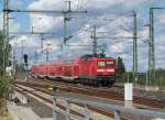 Aus dem Berliner Hbf(tief) fhrt 114 004-5 mit seinem RE5 (RE 38314) nach Stralsund raus.(+3) Seine Reise hat er in Falkenberg(Elster) gestartet.