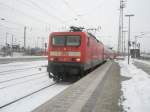 Hier 114 003-7 mit einem RE3 von Schwedt/Oder nach Wnsdorf-Waldstadt, bei der Einfahrt am 24.1.2010 in Angermnde.
