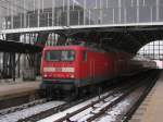 114 023-5 mit einem RE 1 von Berlin Ostbahnhof nach Brandenburg am 24.01. in Berlin Alexanderplatz.