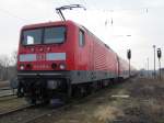 BR 114-033-4 steht mit einem RE im Ehemaligen Gterbahnhof von Schwerin  am 10.03.2011