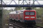 114 027-6 bei der Ausfahrt mit einem RE 1 nach Frankfurt Oder am 11.4.2011