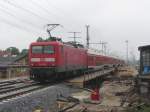 114 030-0 schiebt einen Regionalzug ber die neue Hilfsbrcke in Berlin Karlshorst.