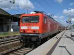 114 018 brachte,am 23.Juni 2012,den RE 18311 Stralsund-Elsterwerda nach Zssow.