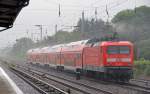 114 037 schob am 14.07.12 bei strmenden Regen einen RE von Magdeburg kommend durch Hirschgarten Richtung Frankfurt(O).