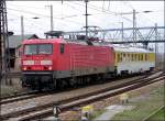 114 501-1 fhrt mit einem Messwagen in Richtung Rgen.  (Stralsund am 30.04.06)