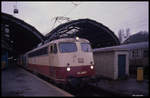 114498 am 7.12.1989 steht hier um 9.33 Uhr mit dem E 3109 nach Hamm am Bahnsteig im HBF Hagen in Westfalen.
