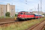 115 336 bringt am 29.07.09 einen russischen Wagen ins Bw Lichtenberg. Fotografiert vom Bahnhof aus.