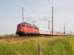 Am 03.07.2010 bespannte 115-509 den EC von Ostseebad Binz nach Brno, hier bei der Einfahrt in Altefhr.