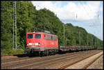 DB 140184 fährt hier am 11.9.2005 mit einem Stahlzug Richtung Münster durch den Bahnhof Natrup Hagen.