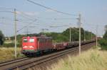 Mit einem gemischten Gterzug fhrt 140 374-0 in Richtung Braunschweig. Fotografiert am 16.07.2010 in Magdeburg Diesdorf. 