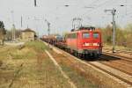 Br 140 037-3 mit leer Stahlzug nach Polen in Lauchhammer, 07/04/2011.