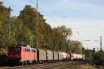 140 676 am 14.10.11 mit einem gemischten Gterzug bei der Durchfahrt durch Ratingen-Lintorf.