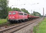 140 354-2 fhrt nach einem Signalhalt mit ihrem Kippwagen-Zug weiter. Aufgenommen am 04.07.2013 in Leipzig-Thekla.