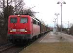 140 401-1 fährt am 15.02.2014 bei Regenwetter mit dem GA 52813 durch Zwickau Pölbitz zum VW-Werk nach Mosel.