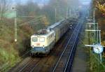 140 530 mit Gterzug Richtung Bremen am 06.11.1994 in Klecken