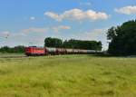 140 018 mit einem Kesselzug am 03.06.2015 bei Schwarzwöhr. 