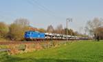 140 853-3 fuhr am 11.04.2015 mit einem ARS-Altmann Zug von Emden nach Bremen, hier in Eisinghausen bei Leer.