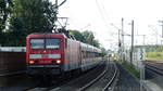 143 632 zieht eine S2 Altdorf - Roth in den Halt Nürnberg-Eibach. Aufgenommen am 29.7.2018 18:32