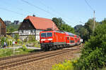 Hier zusehen ist 143 194 mit einer S1 nach Bad Schandau am 30.7.24 in der bekannten Fotokurve bei Rathen im Elbtal.