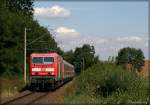143 924-9 verkehrte am Nachmittag des 27.08.2009 mit einem RE von Crailsheim nach Schwbisch Gmnd. Hier bei Rainau-Buch, kurz vor dem nchsten Halt des Zuges im Goldshfer Bahnhof, aufgenommen.
