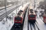 Doppelausfahrt zweier RB aus Bitterfeld. Whrend 143 955 ihre RB nach Leipzig schiebt, schiebt 143 948 ihre nach Halle(S). Fotografiert am 14.02.10.