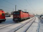 143 300 kam am 04.Dezember 2010 mit der S2 aus Gstrow nach Rostock Hbf.