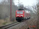 RE9 mit 143 210-3 aus Sassnitz nach Rostock Hbf kurz vor seinem nchsten Halt in Sagard.