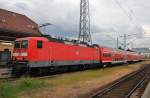 Hier 143 841-5 mit einer S1 von Warnemnde nach Rostock Hbf., dieser Zug stand am 15.6.2013 in Warnemnde.