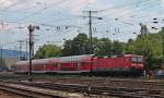 Am Mittag des 08.06.2013 schob die Trierer 143 661-7 eine RB neben dem DB Museum in Koblenz-Ltzel gen Hauptbahnhof.