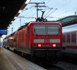 143 852-2 hat ihren Dienst auf der S-Bahn getan und fhrt zum Feierabend ins BW Rostock Hbf.17.10.2013 