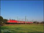 143 658 mit RE17191 Leipzig Hbf - Cottbus kurz vor dem Halt im Bf Falkenberg/Elster, 18.02.07.