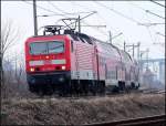 143 092-5  vor dem RE33314 aus Sassnitz kommend.   (Stralsund am 18.03.06) 