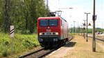 MEG 607 (oder auch 143 310) kam als Tfz am 09.06.2019 aus Roßlau durch Meinsdorf und fuhr weiter in Richtung Berlin.