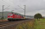 BR 143 + BR 155 der MEG mit dem MEG Zementzug aus Oberhausen nach Nrnberg am 13.10.2013 bei Harrbach Richtung Wrzburg. 